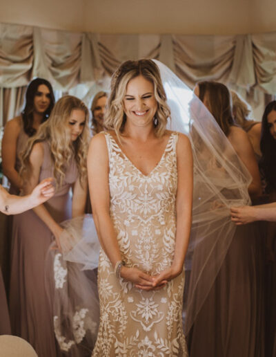 Bridesmaids seeing the bride in her wedding dress for the first time by McKenzie Shea